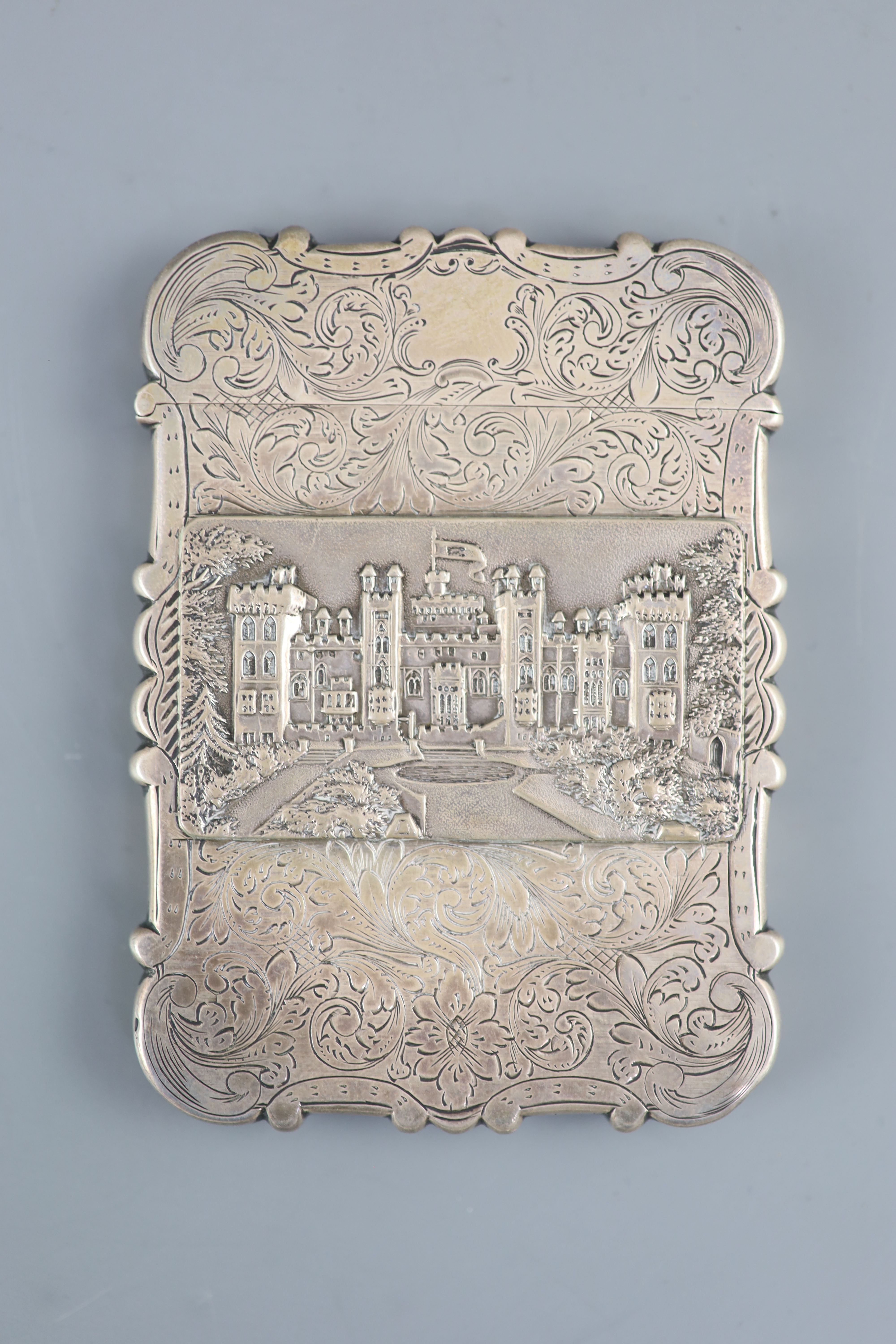 An early Victorian silver double sided castle top card case, depicting views of Windsor and Abbotsford castles,